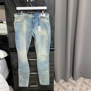 Express stretchy jeans. Leggings mid rise.